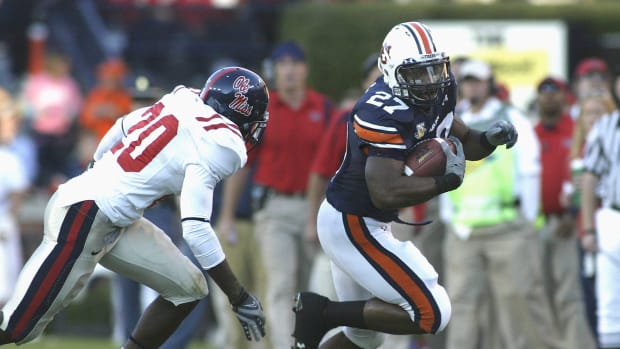 Oct 27, 2007; Auburn, AL, USA; Ole Miss Rebels Johnny Brown (20) chases down Auburn runningback Mario Fannin (27) during the first half at Jordan Hare Stadium in Auburn. The Tigers beat the Rebels 17-3. Mandatory Credit: John Reed-USA TODAY Sports
